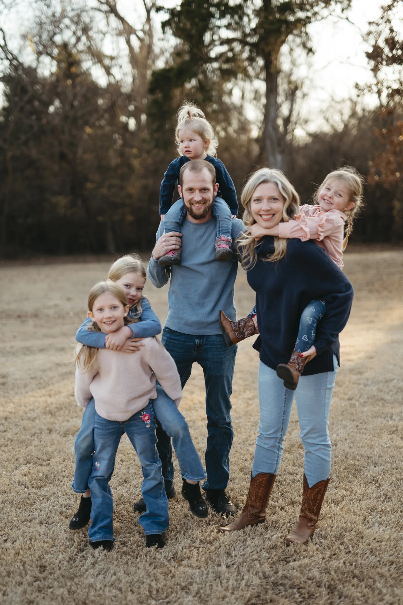 Dr. Curtis Edens outdoors with his wife and four daughters